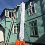 Goulotte à gravats flexible Stortslurf® Ø50 cm posée sur un chantier — aperçu